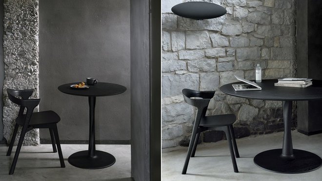 Table ronde Torsion en chêne teinté noir caractérisée par un piètement sculptural, disponible en trois dimensions, et chaise assortie Oak Bok. Création Alain Van Havre pour Ethnicraft.