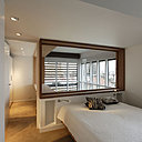 L’agrandissement de la chambre et son dressing réduit le vide sur le salon jugé trop important.