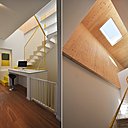 Un jaune couleur chantier type sécurité (RAL 1018) pour l’escalier et sa rampe de métal tubulaire réalisée sur mesure. Le garde-corps est protégé par un filet de sécurité nécessaire pour les enfants encore en bas âge. Le bureau, situé à une place stratégique, permet de travailler à la maison, tout en surveillant les enfants dans leur chambre ou la salle de jeux.