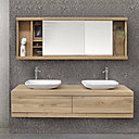 Meubles de salle de bains, modèles suspendus de la ligne Cadence en chêne recouvert d’un vernis mat de protection en usine. Création Ethnicraft.