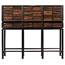 Cabinet « Orion », création Nicolas Aubagnac, ébène du Gabon massif et médaillons en bois de Ziricotte ; corps central ouvrant en abattant avec étagères ; 3 tiroirs en partie basse, édition limitée de 3 pièces estampillées 4A, assemblé en étoile, 39 600 €.