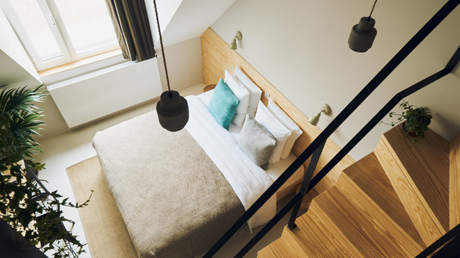 La grande hauteur sous plafond a été exploitée avec une mezzanine qui accueille d’autres couchages.