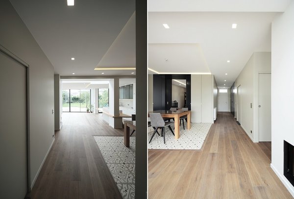 L’entrée est intégrée à la pièce de vie principale dotée d’une cheminée double face.