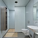 A gauche, paroi de douche en Magna GlasKeramik® cintré (15 mm d’épaisseur) coloris Ice Nugget, un verre blanc à très faible teneur en fer. Création de l’architecte et designer Bilska de Beaupuy, Londres. A droite, pare douche en Magna GlasKeramik ®, coloris Polar White patiné. Création de l’architecte Sobek Group.