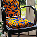 Un fauteuil bridge des années 50 rehoussé de wax.