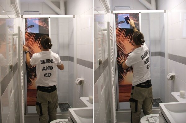 Etapes 3 et 4 :  Positionner le visuel à blanc sur le haut de la vitre ; une fois bien ajusté, enlever la pellicule papier arrière du visuel vinyle sur plus ou moins 30 cm. Puis, à l’aide d’une raclette en plastique souple, maroufler le sticker du centre vers l’extérieur gauche, puis vers l’extérieur droit, en alternance. Progresser ainsi tout le long du visuel de 30 cm en 30 cm, en enlevant au préalable la pellicule papier arrière.