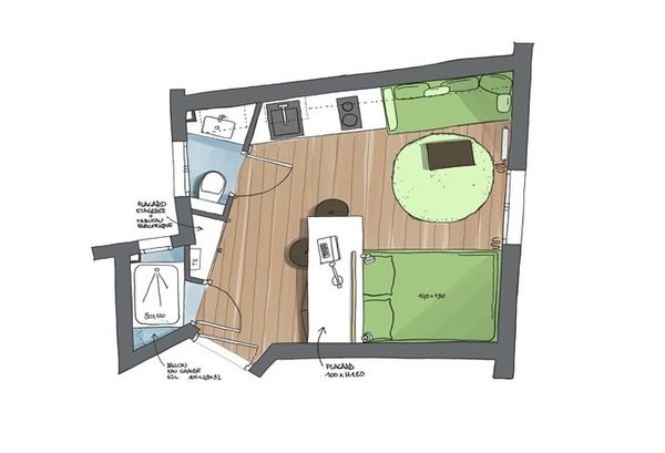 Plan du nouveau studio : pour créer une circulation centrale dans ce petit espace et favoriser la lumière naturelle, tous les meubles et équipements ont été installés le long des murs. La cloison en biais fait aussi gagner de l’espace.