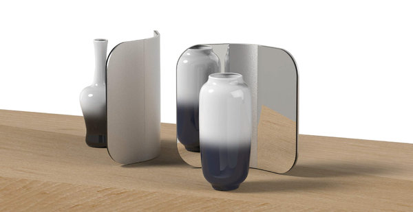 Miroir « Fold Mirror » en aluminium et verre, décliné en deux tailles et vases « Visage » en porcelaine (modèle Flower vase blue and black). Création Michael Young studio pour Zens en 2019.