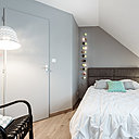 Dans la chambre de la fille, tête de lit en feutrine et housse de couette, La Redoute. Guirlande, La Case de cousin Paul.