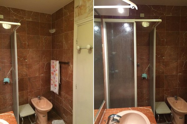 Avant les travaux, l’espace douche vétuste de la salle de bains qui fait cohabiter sans harmonie deux types de marbre.