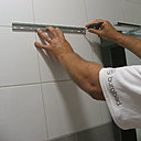 Etape 3 : vérifier le positionnement définitif des fixations du rail.