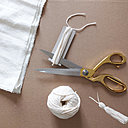 2- Réalisation des glands en fil de coton blanc.