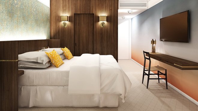 La chambre type est habillée de noyer avec une alcôve pour le lit et un volume en bois qui sculpte l’espace de la salle de bains.